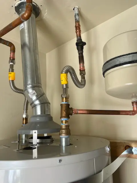 Water heater installation and plumbing repair in Piney Oaks